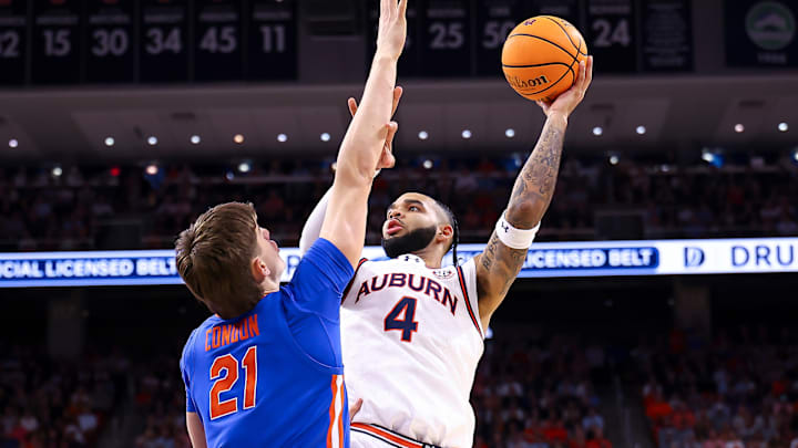 Auburn's Johni Broome had 18 points and 11 rebounds and Florida's Alex Condon had 17 points and 10 rebounds in their 1st meeting.