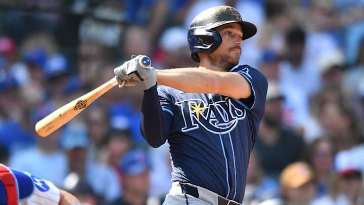 Sep 13, 2025; Chicago, Illinois, USA; Tampa Bay Rays second baseman Brandon Lowe (8) hits an RBI single against the Chicago Cubs during the sixth inning at Wrigley Field. Mandatory Credit: Patrick Gorski-Imagn Images