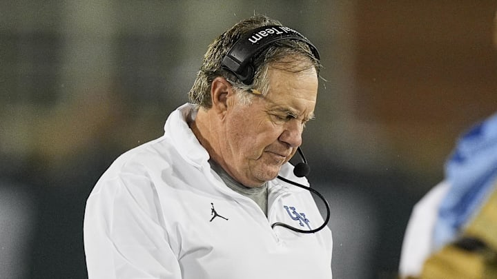 Sep 6, 2025; Charlotte, North Carolina, USA; North Carolina Tar Heels head coach Bill Belichick looks at his iPad during the second half against the Charlotte 49ers at Jerry Richardson Stadium. Mandatory Credit: Jim Dedmon-Imagn Images Sep 6, 2025; Charlotte, North Carolina, USA; North Carolina Tar Heels head coach Bill Belichick looks at his iPad during the second half against the Charlotte 49ers at Jerry Richardson Stadium. Mandatory Credit: Jim Dedmon-Imagn Images