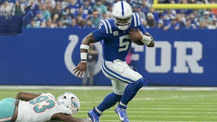 Oct 20, 2024; Indianapolis, Indiana, USA; Indianapolis Colts quarterback Anthony Richardson (5) rushes with the ball during a game against the Miami Dolphins at Lucas Oil Stadium. Mandatory Credit: Christine Tannous/IndyStar USA TODAY Network via Imagn Images Oct 20, 2024; Indianapolis, Indiana, USA; Indianapolis Colts quarterback Anthony Richardson (5) rushes with the ball during a game against the Miami Dolphins at Lucas Oil Stadium. Mandatory Credit: Christine Tannous/IndyStar USA TODAY Network via Imagn Images