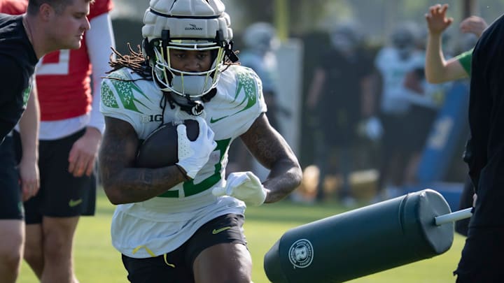 Oregon running back Jordan James works out during open practice for the Oregon Ducks.