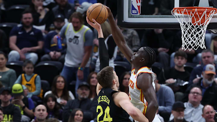 Mar 15, 2024; Salt Lake City, Utah, USA; Atlanta Hawks center Clint Capela (15) blocks the shot of Utah Jazz center Walker Kessler (24) during the second quarter at Delta Center. Mandatory Credit: Rob Gray-Imagn Images