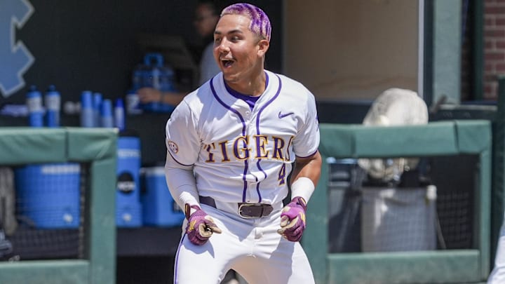 May 31, 2024; Chapel Hill, NC, USA; LSU infielder Steven Milam (4) celebrates his winning home run against the Wofford Terriers during the NCAA Regional in Chapel Hill. Mandatory Credit: Jim Dedmon-Imagn Images May 31, 2024; Chapel Hill, NC, USA; LSU infielder Steven Milam (4) celebrates his winning home run against the Wofford Terriers during the NCAA Regional in Chapel Hill. Mandatory Credit: Jim Dedmon-Imagn Images