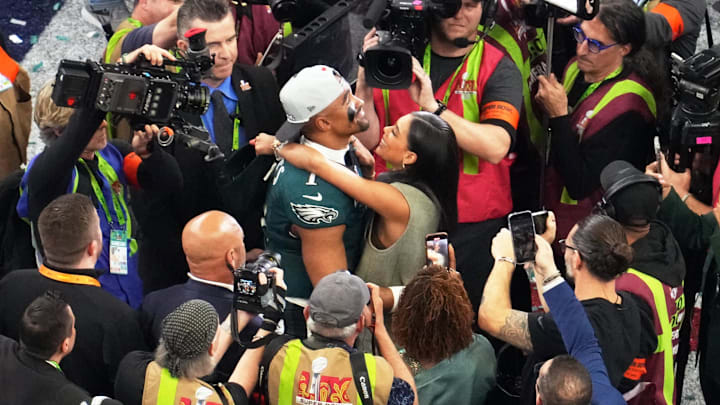 Philadelphia Eagles quarterback Jalen Hurts hugs then-fiancee Bry Burrows after the Eagles won the Super Bowl on Feb 9, 2025.