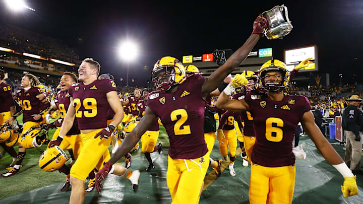 Arizona State Sun Devils wide receiver Brandon Aiyuk (2) holds up the Territorial Cup trophy after defeating Arizona 24-14 at the 93rd Duel in the Desert on Nov. 30, 2019, in Tempe.

Arizona Wildcats Vs Arizona State Sun Devils