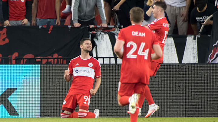 Hugo Cuypers #9 (L) celebrates scoring a goal during the MLS...