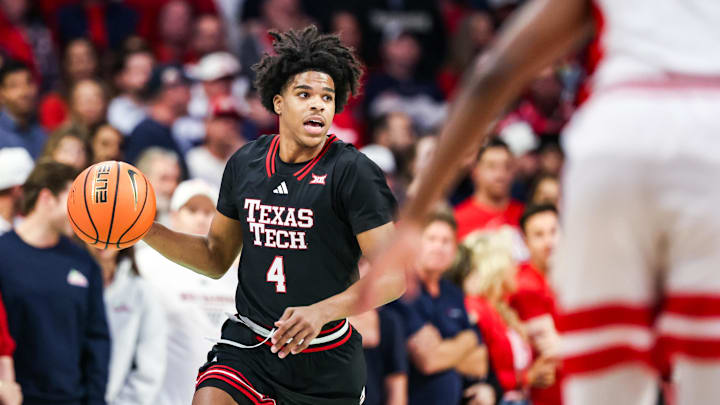 Feb 14, 2026; Tucson, Arizona, USA; Texas Tech Red Raiders guard Christian Anderson (4) dribbles the ball down the court during the first half of the game against the Arizona Wildcats at McKale Memorial Center. Mandatory Credit: Aryanna Frank-Imagn Images