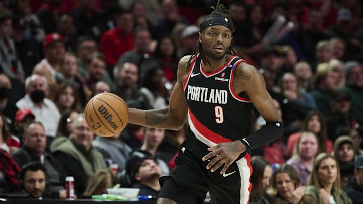 Jan 19, 2025; Portland, Oregon, USA; Portland Trail Blazers forward Jerami Grant (9) dribbles the basketball during the second half against the Chicago Bulls at Moda Center. Mandatory Credit: Troy Wayrynen-Imagn Images