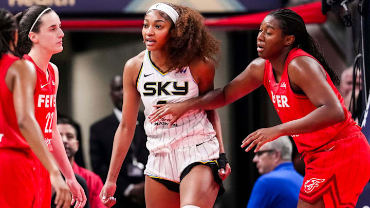 Chicago Sky forward Angel Reese (5) reacts to a flagrant foul from Indiana Fever guard Caitlin Clark (22) on Saturday, May 17, 2025, during a game between the Indiana Fever and the Chicago Sky at Gainbridge Fieldhouse in Indianapolis. The Indiana Fever defeated the Chicago Sky, 93-58.