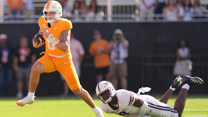 Tennessee quarterback Joey Aguilar (6) scrambles with the ball during a college football game between Tennessee and Mississippi State at Davis Wade Stadium in Starkville, Miss., on Sept. 27, 2025. Tennessee quarterback Joey Aguilar (6) scrambles with the ball during a college football game between Tennessee and Mississippi State at Davis Wade Stadium in Starkville, Miss., on Sept. 27, 2025.