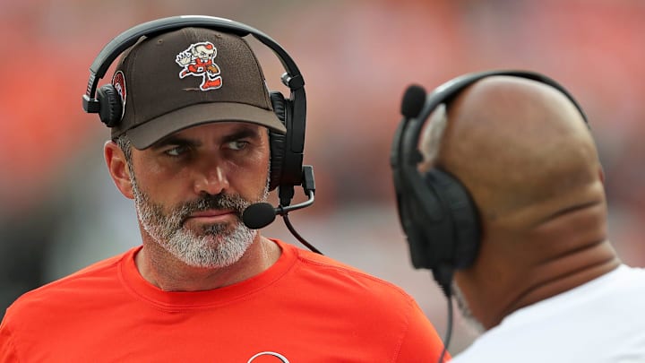 Cleveland Browns head coach Kevin Stefanski speaks with a member of his coaching staff during the second half of an NFL preseason football game at Cleveland Browns Stadium, Saturday, Aug. 10, 2024, in Cleveland, Ohio.