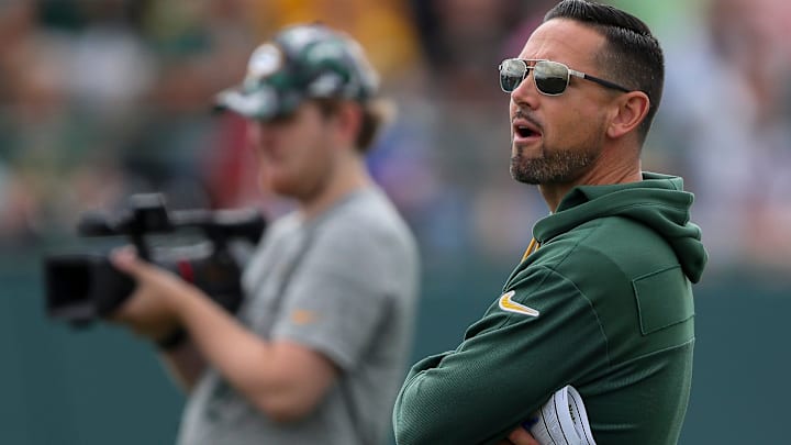 Green Bay Packers head coach Matt LaFleur surveys practice, at Ray Nitschke Field in Green Bay, Wis.