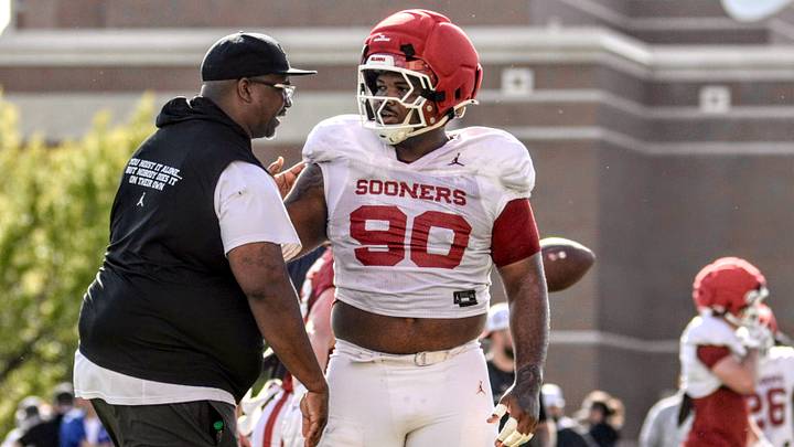Oklahoma defensive tackles coach Todd Bates talks to Trent Wilson between reps at one of the Sooners' spring practices. Oklahoma defensive tackles coach Todd Bates talks to Trent Wilson between reps at one of the Sooners' spring practices.