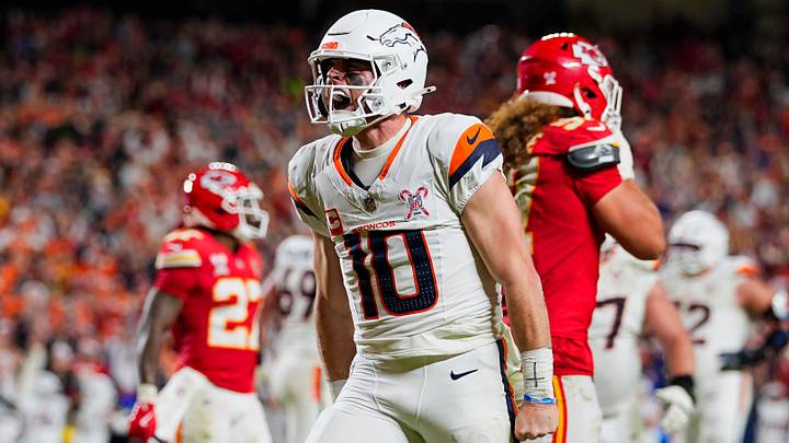 Dec 25, 2025; Kansas City, Missouri, USA; Denver Broncos quarterback Bo Nix (10) celebrates after scoring a touchdown.