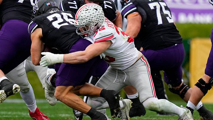 Nov 5, 2022; Evanston, Illinois, USA; Ohio State Buckeyes linebacker Tommy Eichenberg (35) tackles Nov 5, 2022; Evanston, Illinois, USA; Ohio State Buckeyes linebacker Tommy Eichenberg (35) tackles