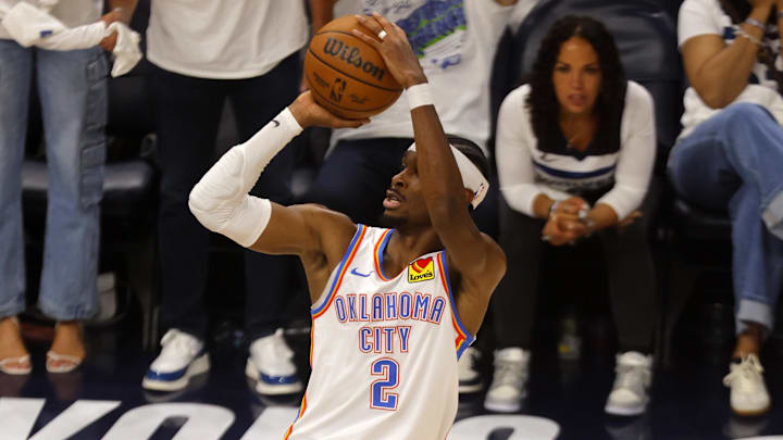 May 26, 2025; Minneapolis, Minnesota, USA;Oklahoma City Thunder guard Shai Gilgeous-Alexander (2) shoots the ball against the Minnesota Timberwolves  in the second half during game four of the western conference finals for the 2025 NBA Playoffs at Target Center. Mandatory Credit: Bruce Kluckhohn-Imagn Images