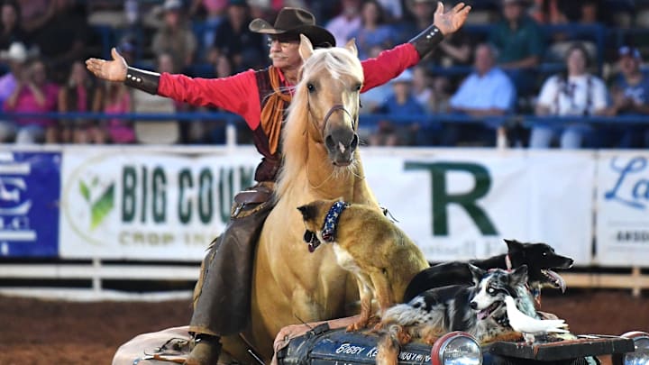 Bobby Kerr and his mustang sit in a car during the historic 94th annual Texas Cowboy Reunion in Stamford on Friday, July 5, 2024. Bobby Kerr and his mustang sit in a car during the historic 94th annual Texas Cowboy Reunion in Stamford on Friday, July 5, 2024.