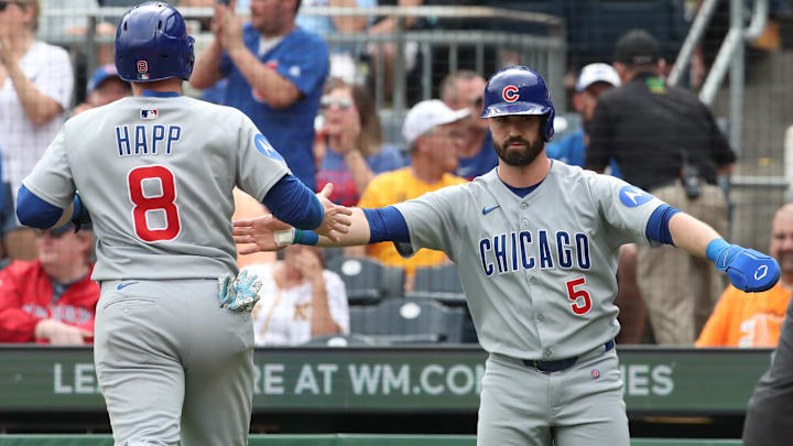 May 1, 2025; Pittsburgh, Pennsylvania, USA; Chicago Cubs left fielder Ian Happ (8) and third baseman Jon Berti (5) celebrate as both players scored runs against the Pittsburgh Pirates during the ninth inning at PNC Park. May 1, 2025; Pittsburgh, Pennsylvania, USA; Chicago Cubs left fielder Ian Happ (8) and third baseman Jon Berti (5) celebrate as both players scored runs against the Pittsburgh Pirates during the ninth inning at PNC Park.