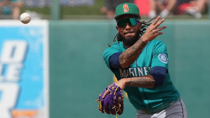 Seattle Mariners shortstop J.P. Crawford makes a play during a spring training game against the Athletics on March 17 at Hohokam Stadium.