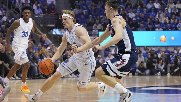 Jan 26, 2026; Provo, Utah, USA; BYU Cougars guard Richie Saunders (15) drives during the first half against the Arizona Wildcats at Marriott Center. Mandatory Credit: Aaron Baker-Imagn Images 
