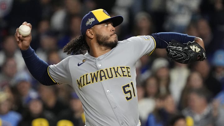 Oct 9, 2025; Chicago, Illinois, USA; Milwaukee Brewers pitcher Freddy Peralta (51) throws pitch against the Chicago Cubs during the first inning for game four of the NLDS round for the 2025 MLB playoffs at Wrigley Field. Mandatory Credit: David Banks-Imagn Images