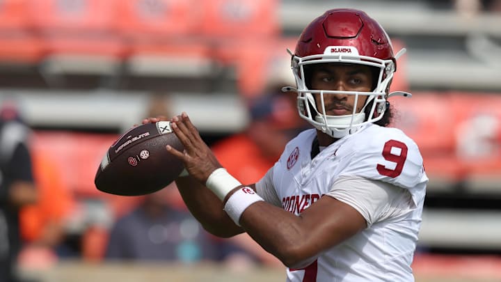 Sep 28, 2024; Auburn, Alabama, USA;  Oklahoma Sooners quarterback Michael Hawkins Jr. (9) warms up before the game against the Auburn Tigers at Jordan-Hare Stadium. Mandatory Credit: John Reed-Imagn Images