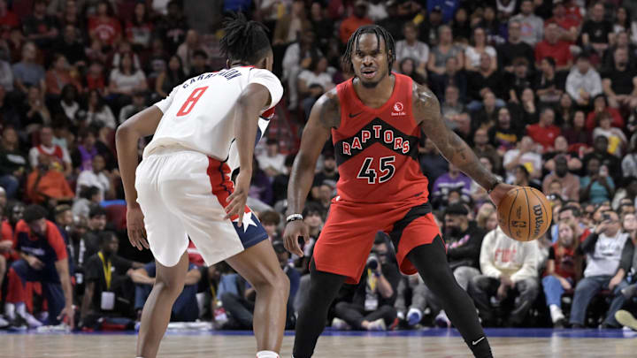 Oct 6, 2024; Montreal, Quebec, CAN; Toronto Raptors point guard Davion Mitchell (45) dribbles and Washington Wizards guard Bub Carrington (8) defends during the third quarter at the Bell Centre. Mandatory Credit: Eric Bolte-Imagn Images Oct 6, 2024; Montreal, Quebec, CAN; Toronto Raptors point guard Davion Mitchell (45) dribbles and Washington Wizards guard Bub Carrington (8) defends during the third quarter at the Bell Centre. Mandatory Credit: Eric Bolte-Imagn Images