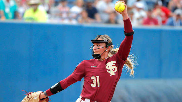 Florida State's Makenna Reid (31) throws a pitch during a softball game between Washington and Florida State in the Women's College World Series at USA Softball Hall of Fame Stadium in  in Oklahoma City, Saturday, June, 3, 2023.