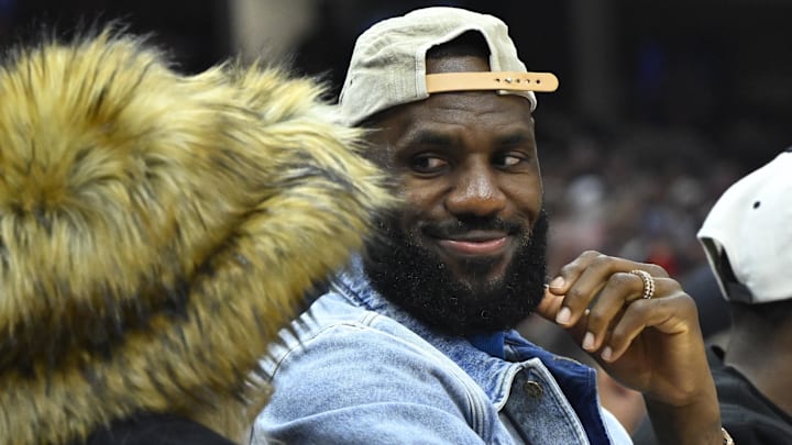 May 13, 2024; Cleveland, Ohio, USA; Los Angeles Lakers forward LeBron James looks at his wife Savannah James in the second quarter of game four of the second round for the 2024 NBA playoffs between the Cleveland Cavaliers and the Boston Celtics at Rocket Mortgage FieldHouse. Mandatory Credit: David Richard-USA TODAY Sports
