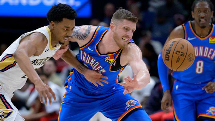 Dec 7, 2024; New Orleans, Louisiana, USA; Oklahoma City Thunder center Isaiah Hartenstein (55) steals the ball from New Orleans Pelicans guard Trey Murphy III (25) during the first half at Smoothie King Center. Mandatory Credit: Matthew Hinton-Imagn Images Dec 7, 2024; New Orleans, Louisiana, USA; Oklahoma City Thunder center Isaiah Hartenstein (55) steals the ball from New Orleans Pelicans guard Trey Murphy III (25) during the first half at Smoothie King Center. Mandatory Credit: Matthew Hinton-Imagn Images