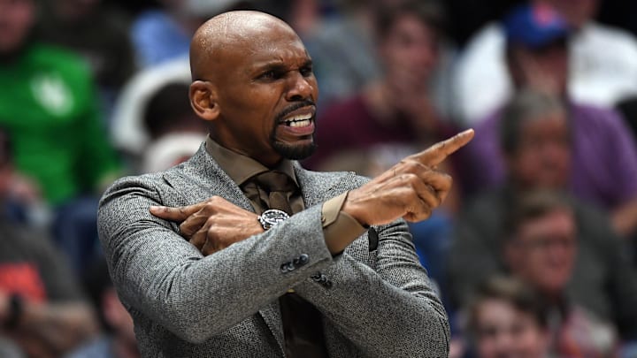 Mar 13, 2024; Nashville, TN, USA; Vanderbilt Commodores head coach Jerry Stackhouse yells from the bench in overtime against the Arkansas Razorbacks at Bridgestone Arena. Mandatory Credit: Christopher Hanewinckel-Imagn Images