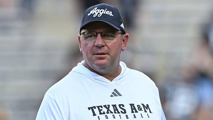 Oct 4, 2025; College Station, Texas, USA; Texas A&M Aggies head coach Mike Elko looks on prior to the game against the Mississippi State Bulldogs at Kyle Field. Oct 4, 2025; College Station, Texas, USA; Texas A&M Aggies head coach Mike Elko looks on prior to the game against the Mississippi State Bulldogs at Kyle Field.