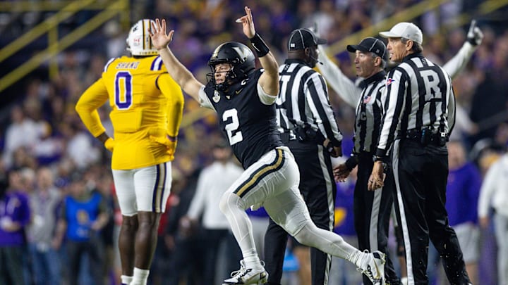 Nov 23, 2024; Baton Rouge, Louisiana, USA;  Vanderbilt Commodores quarterback Diego Pavia (2) reacts to throwing a touchdown pass against the LSU Tigers during the first half at Tiger Stadium. 