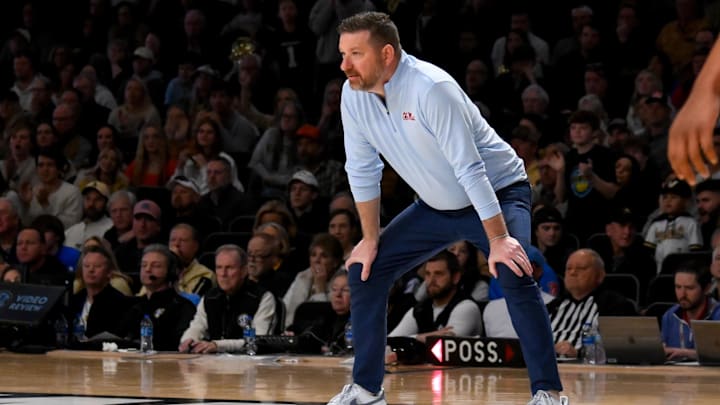 Feb 22, 2025; Nashville, Tennessee, USA;  Mississippi Rebels head coach Chris Beard watches his team against the Vanderbilt Commodores during the second half at Memorial Gymnasium. Mandatory Credit: Steve Roberts-Imagn Images