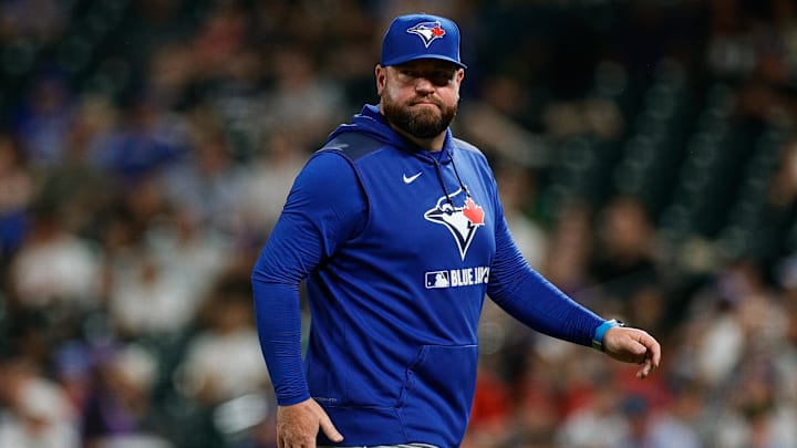 Aug 5, 2025; Denver, Colorado, USA; Toronto Blue Jays manager John Schneider (14) in the sixth inning against the Colorado Rockies at Coors Field. 