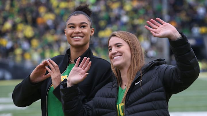 Former Oregon women basketball players Satou Sabally, left, and Sabrina Ionescu are introduced during the Oregon Colorado Saturday Oct. 30, 2021.

Eug 103021 Uo Cofb10
