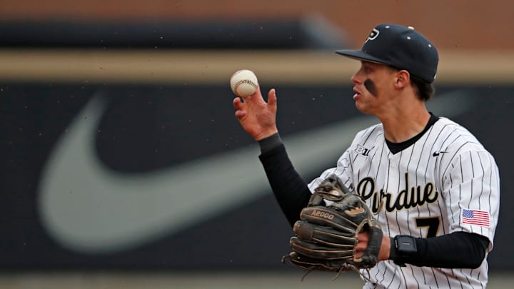 Purdue infielder Camden Gasser (7) fields a ground ball during the NCAA baseball game 