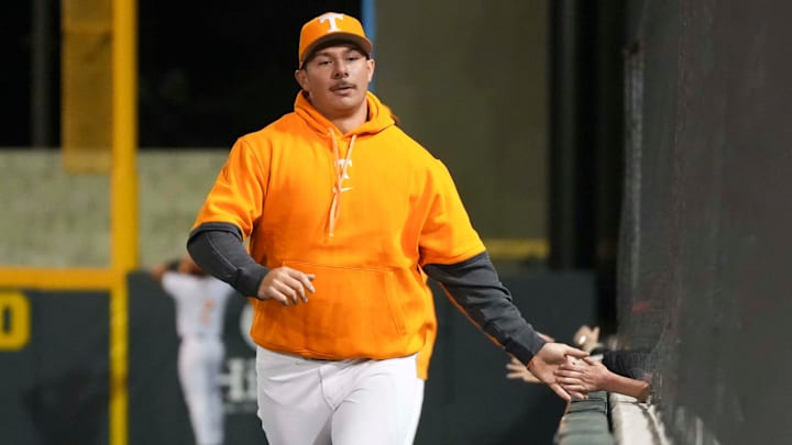 Tennessee first baseman Alberto Osuna (45) high-fives fans during a NCAA baseball game between Tennessee and St. Bonaventure at Lindsey Nelson Stadium on Friday, March 6, 2025.