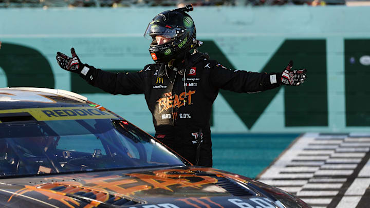 Oct 27, 2024; Homestead, Florida, USA; NASCAR Cup Series driver Tyler Reddick (45) celebrates after winning the Straight Talk Wireless 400 at Homestead-Miami Speedway. Mandatory Credit: Jasen Vinlove-Imagn Images
