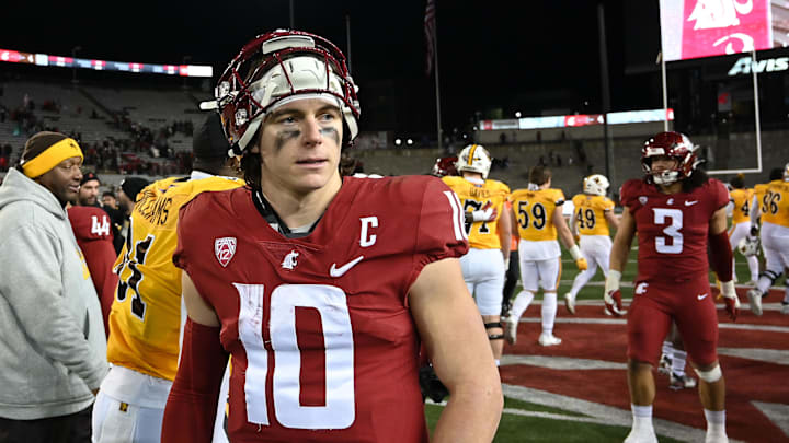 Nov 30, 2024; Pullman, Washington, USA; Washington State Cougars quarterback John Mateer (10) walks off the field after a game against the Wyoming Cowboys at Gesa Field at Martin Stadium. Washington State Cougars won 15-14. Mandatory Credit: James Snook-Imagn Images