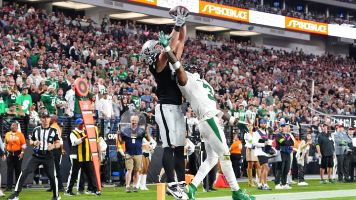 Nov 12, 2023; Paradise, Nevada, USA; Las Vegas Raiders tight end Michael Mayer (87) makes a touchdown reception over the reach of New York Jets safety Jordan Whitehead (3) during the fourth quarter at Allegiant Stadium. Mandatory Credit: Stephen R. Sylvanie-USA TODAY Sports Nov 12, 2023; Paradise, Nevada, USA; Las Vegas Raiders tight end Michael Mayer (87) makes a touchdown reception over the reach of New York Jets safety Jordan Whitehead (3) during the fourth quarter at Allegiant Stadium. Mandatory Credit: Stephen R. Sylvanie-USA TODAY Sports