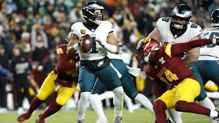 Dec 20, 2025; Landover, Maryland, USA; Philadelphia Eagles quarterback Jalen Hurts (1) passes against the Washington Commanders in the second half at Northwest Stadium. Mandatory Credit: Geoff Burke-Imagn Images