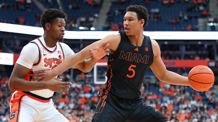 Jan 24, 2026; Syracuse, New York, USA; Miami Hurricanes forward Malik Reneau (5) drives against Syracuse Orange forward Tyler Betsey (5) during the first half at the JMA Wireless Dome. Mandatory Credit: Rich Barnes-Imagn Images Jan 24, 2026; Syracuse, New York, USA; Miami Hurricanes forward Malik Reneau (5) drives against Syracuse Orange forward Tyler Betsey (5) during the first half at the JMA Wireless Dome. Mandatory Credit: Rich Barnes-Imagn Images