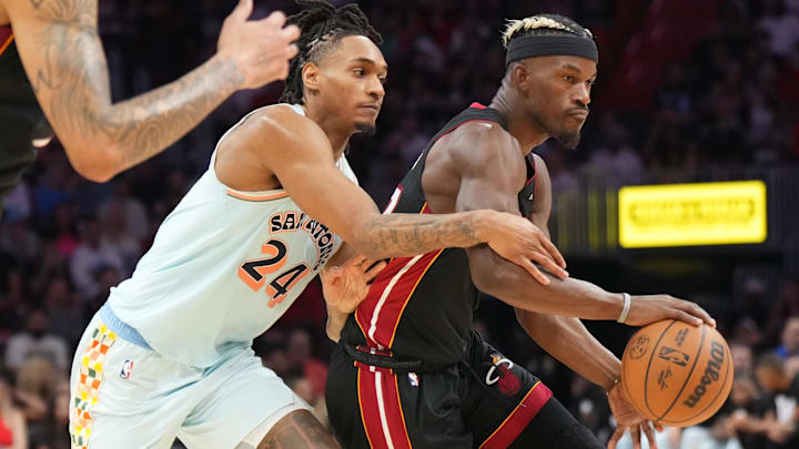Jan 19, 2025; Miami, Florida, USA; San Antonio Spurs guard Devin Vassell (24) defends Miami Heat forward Jimmy Butler (22) during the second half at Kaseya Center. Mandatory Credit: Jim Rassol-Imagn Images Jan 19, 2025; Miami, Florida, USA; San Antonio Spurs guard Devin Vassell (24) defends Miami Heat forward Jimmy Butler (22) during the second half at Kaseya Center. Mandatory Credit: Jim Rassol-Imagn Images