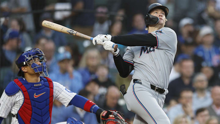 May 14, 2025; Chicago, Illinois, USA; Miami Marlins center fielder Kyle Stowers (28) hits a solo home run against the Chicago Cubs during the fourth inning at Wrigley Field. Mandatory Credit: Kamil Krzaczynski-Imagn Images May 14, 2025; Chicago, Illinois, USA; Miami Marlins center fielder Kyle Stowers (28) hits a solo home run against the Chicago Cubs during the fourth inning at Wrigley Field. Mandatory Credit: Kamil Krzaczynski-Imagn Images