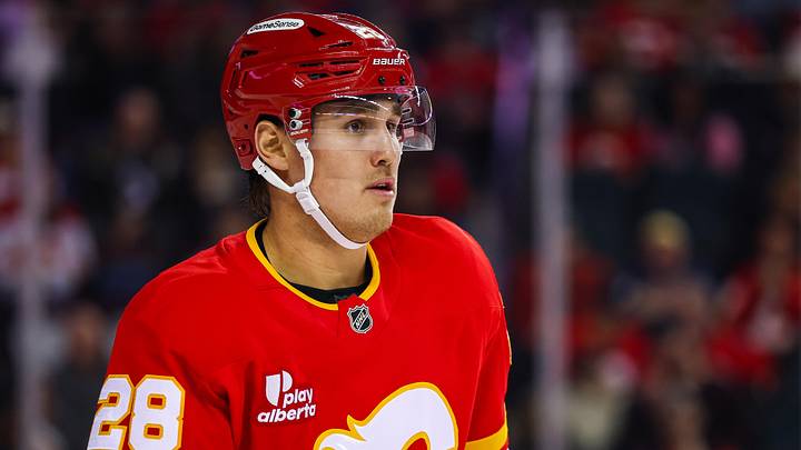 Apr 14, 2026; Calgary, Alberta, CAN; Calgary Flames defenseman Zach Whitecloud (28) skates against the Colorado Avalanche during the first period at Scotiabank Saddledome. Mandatory Credit: Sergei Belski-Imagn Images