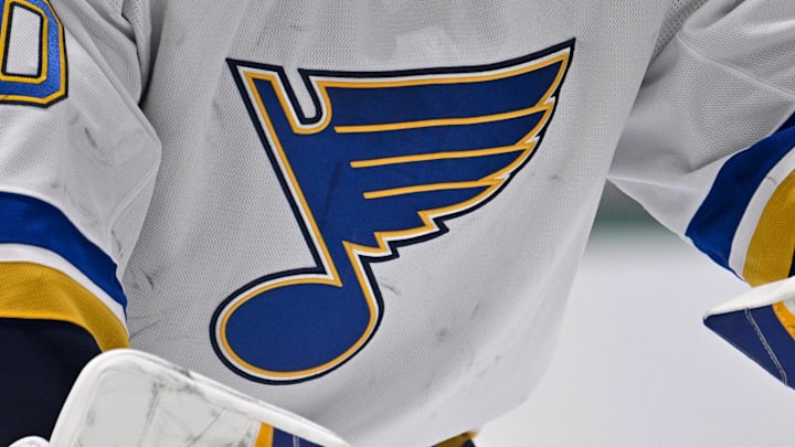 Dec 14, 2024; Dallas, Texas, USA; A view of the Blues logo on the jersey of St. Louis Blues goaltender Jordan Binnington (50) during the game between the Dallas Stars and the St. Louis Blues at American Airlines Center. Mandatory Credit: Jerome Miron-Imagn Images