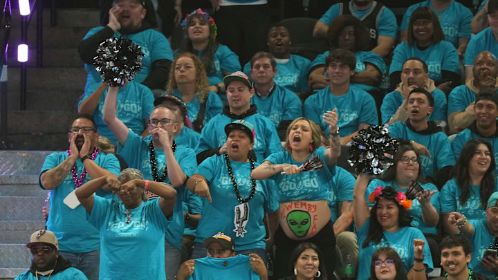 Apr 19, 2026; San Antonio, Texas, USA; San Antonio Spurs fan wears an alien on her stomach during the first half of game one of the first round of the 2026 NBA Playoffs against the Portland Trail Blazers at Frost Bank Center. Mandatory Credit: Scott Wachter-Imagn Images