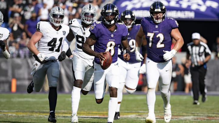 Baltimore Ravens quarterback Lamar Jackson (8) runs during the second half against the Las Vegas Raiders at M&T Bank Stadium. Baltimore Ravens quarterback Lamar Jackson (8) runs during the second half against the Las Vegas Raiders at M&T Bank Stadium.