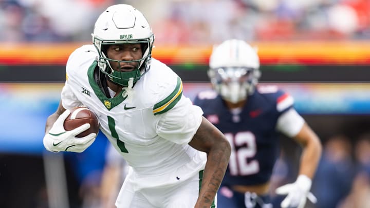 Nov 22, 2025; Tucson, Arizona, USA; Baylor Bears tight end Michael Trigg (1) against the Arizona Wildcats at Casino Del Sol Stadium. Mandatory Credit: Mark J. Rebilas-Imagn Images Nov 22, 2025; Tucson, Arizona, USA; Baylor Bears tight end Michael Trigg (1) against the Arizona Wildcats at Casino Del Sol Stadium. Mandatory Credit: Mark J. Rebilas-Imagn Images